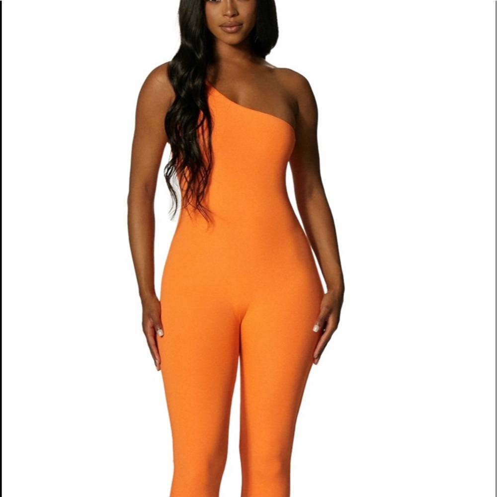NAKED WORDROBE- Orange Skin to Skin jumpsuit NWT!